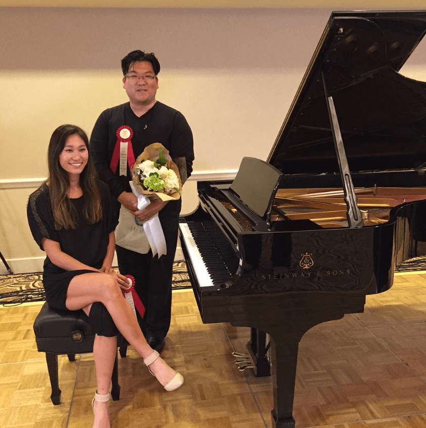 Sue Zhou with a student after a recital