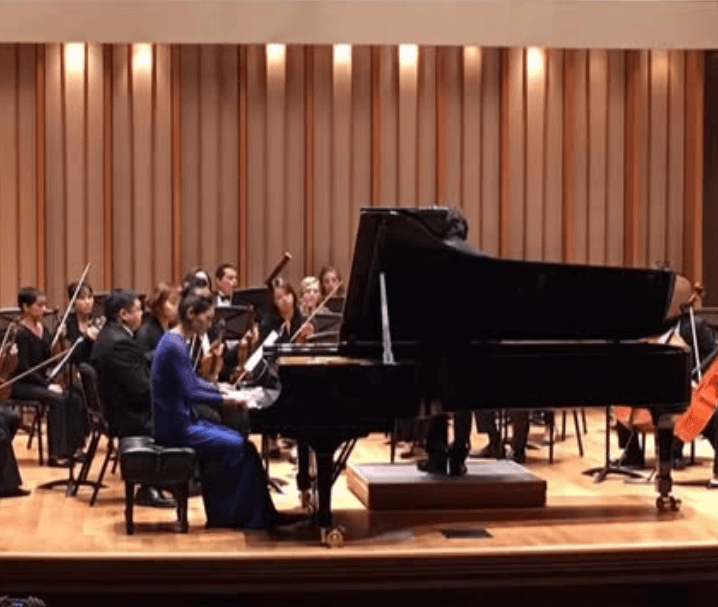 Sue Zhou performing as concert soloist